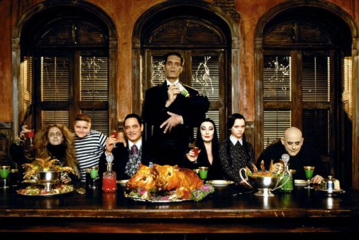 The Addams Family at a holiday table